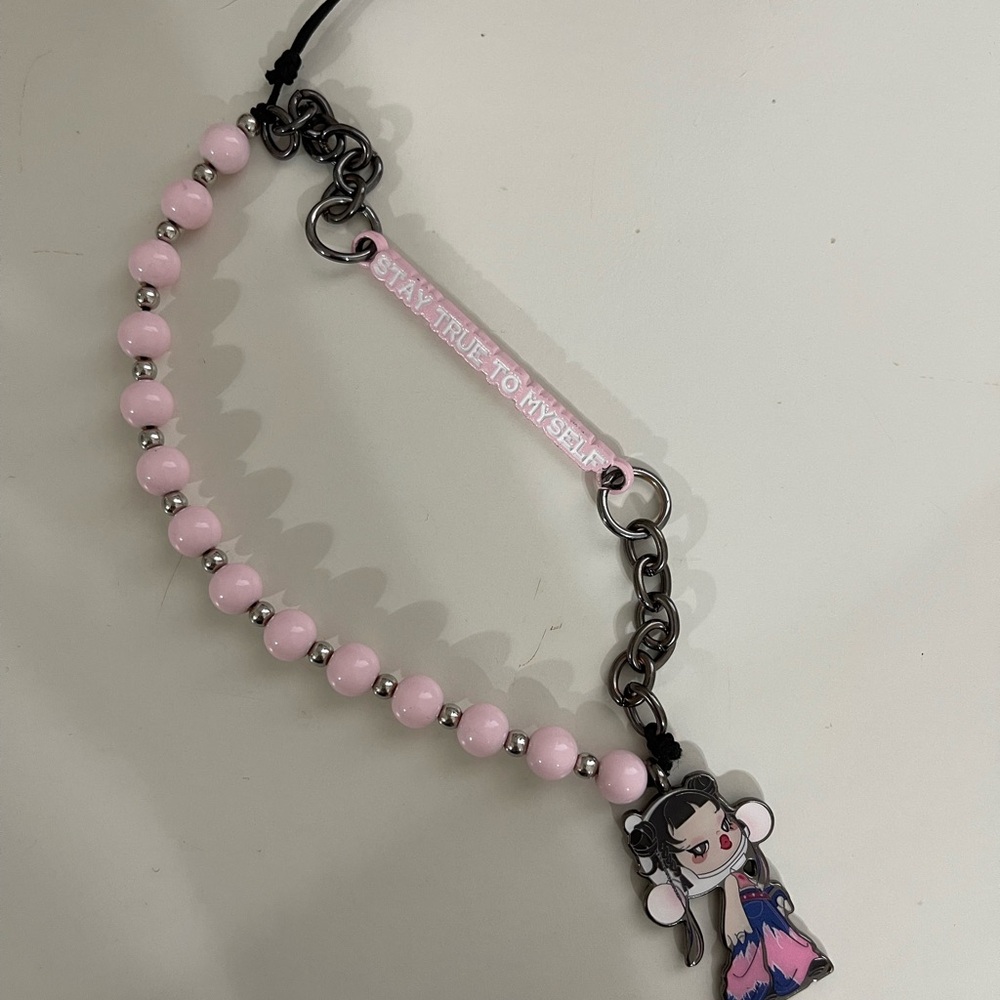 Skullpanda Pink Beaded phone charm with